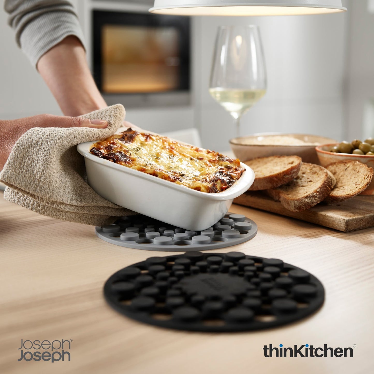 Joseph Joseph Spot On Round Trivets Grey | Stylish Silicone Trivets for Dining Table | Heat-Resistant & Scratch-Proof Surface Protectors | Compact & Modern Kitchen Accessories