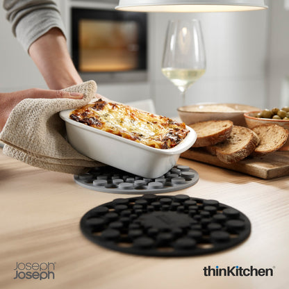 Joseph Joseph Spot On Round Trivets Grey | Stylish Silicone Trivets for Dining Table | Heat-Resistant & Scratch-Proof Surface Protectors | Compact & Modern Kitchen Accessories