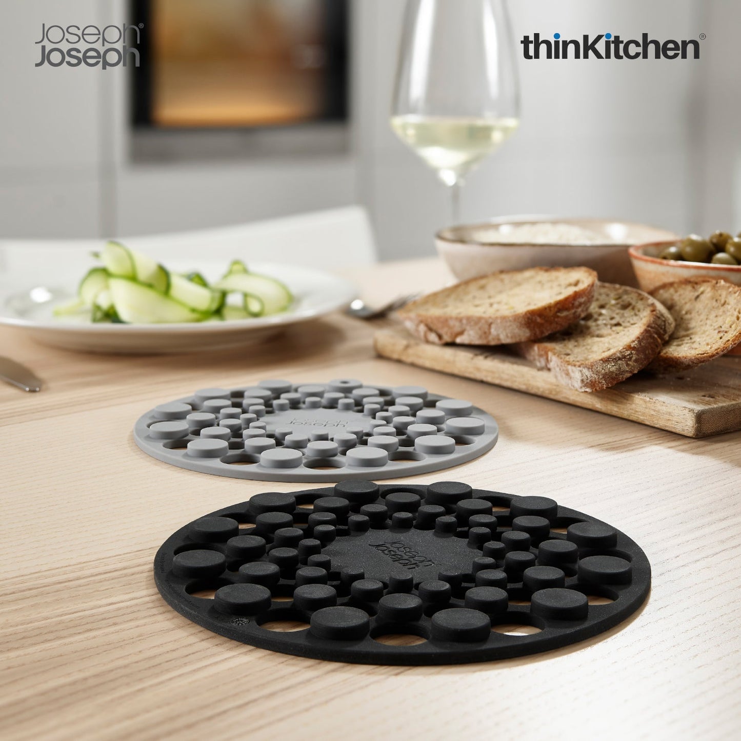 Joseph Joseph Spot On Round Trivets Grey | Stylish Silicone Trivets for Dining Table | Heat-Resistant & Scratch-Proof Surface Protectors | Compact & Modern Kitchen Accessories
