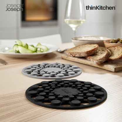 Joseph Joseph Spot On Round Trivets Grey | Stylish Silicone Trivets for Dining Table | Heat-Resistant & Scratch-Proof Surface Protectors | Compact & Modern Kitchen Accessories